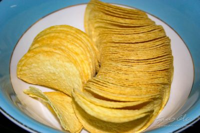A tasty bowl of salty Pringles potato chips