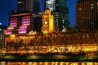 Colourful waterfront of Flinders street station historic building