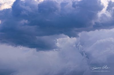 JCCI-100147 - Deep dark blue grey menacing stormy clouds