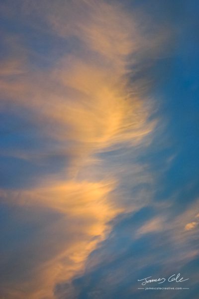 JCCI-100157 - Wispy pink and orange clouds captured by the warm sunset