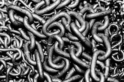 JCCI-100188 - Pile of chains linked together in high contrast black and white
