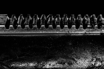 JCCI-100214 - Straight metal gears of industrial machinery grime and greasy in black and white
