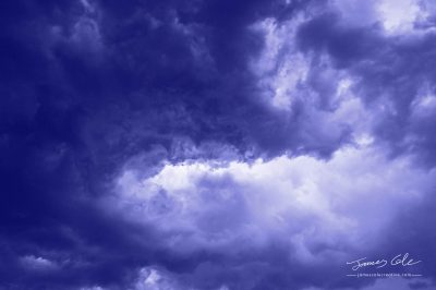 JCCI-100215 - Blue Swirling angry menacing dark grey stormy clouds