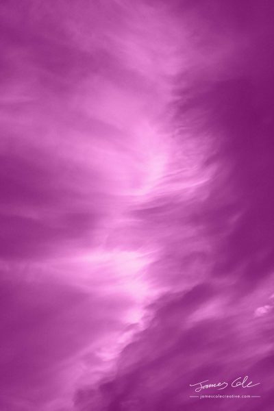 JCCI-100238 - Wispy pinky purple clouds captured by the warm sunset