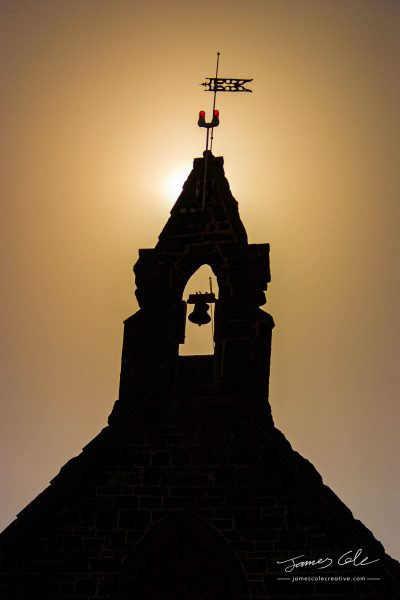 JCCI-100599 - Silhouette of old church bell tower at sunset in Bulla Victoria